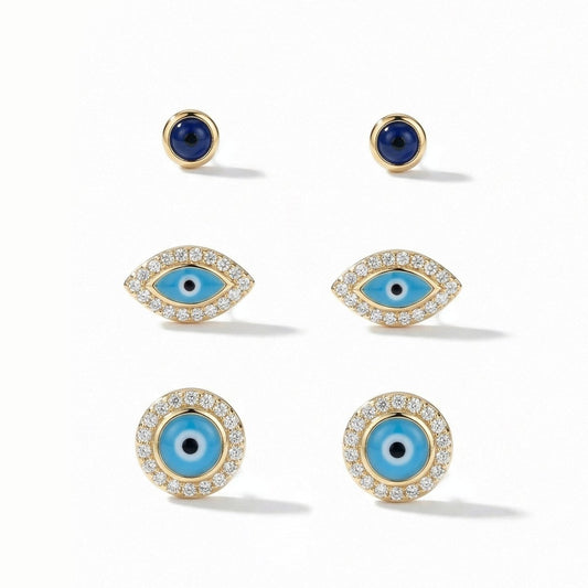 Minimal evil eye earring set with crystal detailing and an anti-tarnish gold finish, perfect for everyday wear and meaningful styling.
