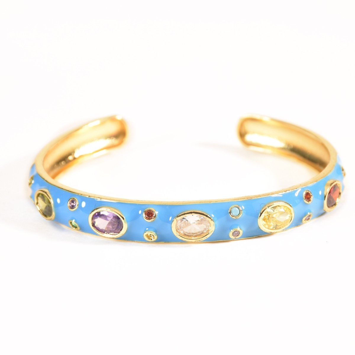 Elegant rainbow cuff bangles in soft pastel shades with an adjustable anti-tarnish finish, perfect for everyday wear, playful styling, and adding a colorful touch to any look.
