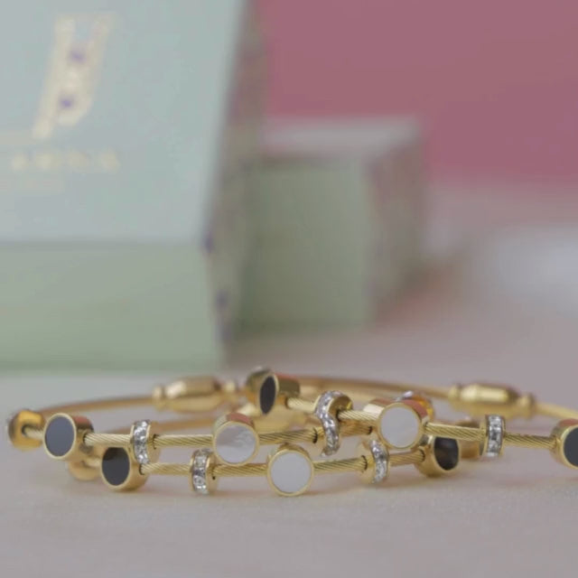 Elegant lightweight magnetic lock bangle crafted from anti-tarnish alloy with a sleek minimalist design, available in rose gold, gold, and silver, perfect for everyday styling, stacking with watches and bangles, and thoughtful gifting.
