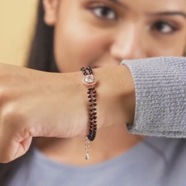 Round diamond mangalsutra bracelet with sparkling crystal detailing and an anti-tarnish rose gold finish, perfect for everyday wear and elegant styling.

