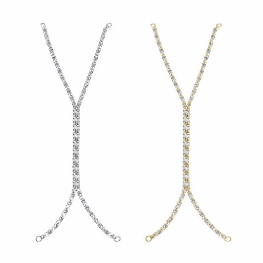 Shimmering link hand chain with baguette crystal detailing and an anti-tarnish finish, available in gold and silver, perfect for elegant styling and special occasions.
