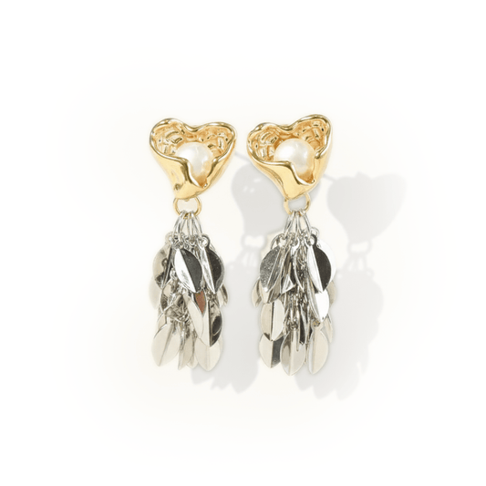 Silver leaf cascade earrings with pearl detailing and an anti-tarnish silver finish, perfect for elegant styling and special occasions.
