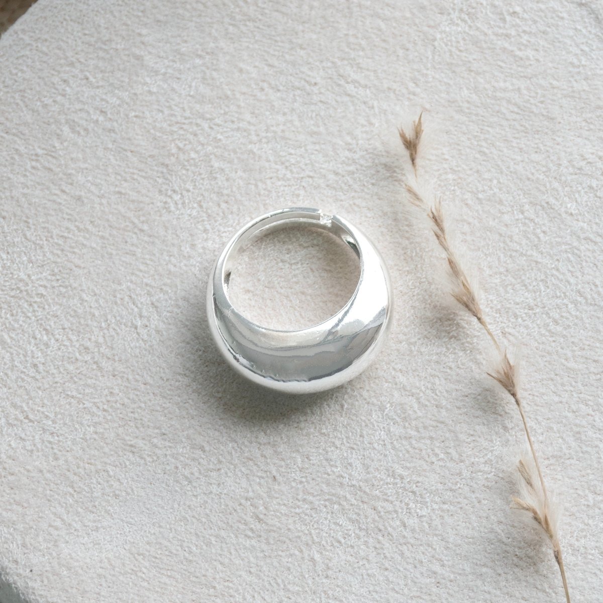 Minimal band ring with a sleek polished design and an anti-tarnish silver finish, perfect for everyday wear, modern styling, and effortless stacking.
