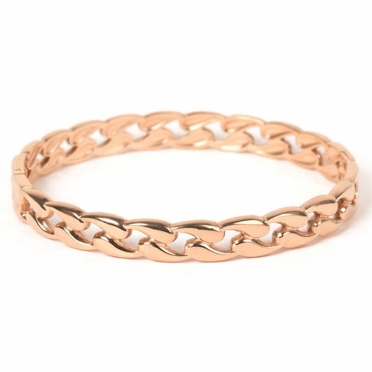 Luxury rose gold anti-tarnish chain-link bangle featuring bold Cuban-style links, polished stainless steel construction, and a secure hinged clasp, displayed on a clean white background