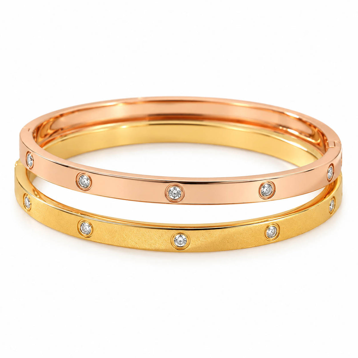 Two-tone crystal bangle set with a polished rose gold and matte gold finish, accented by bezel-set sparkling crystals. Elegant, anti-tarnish, and perfect for everyday wear or stacking.