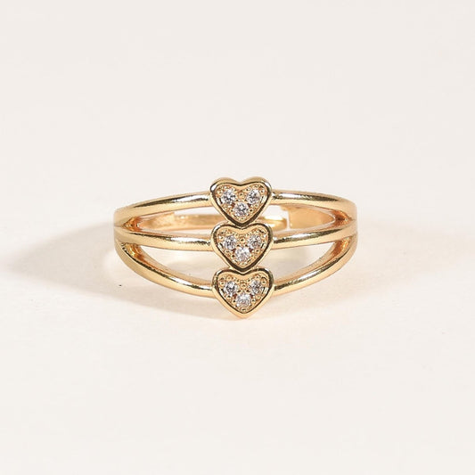 Triple heart ring with a sleek heart motif design and an anti-tarnish gold finish, perfect for everyday wear, playful styling, and effortless stacking.