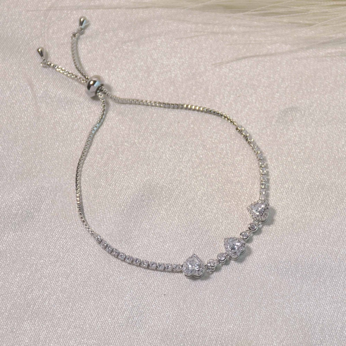 Triple Heart Tennis Bracelet - Upakarnaproduct_type