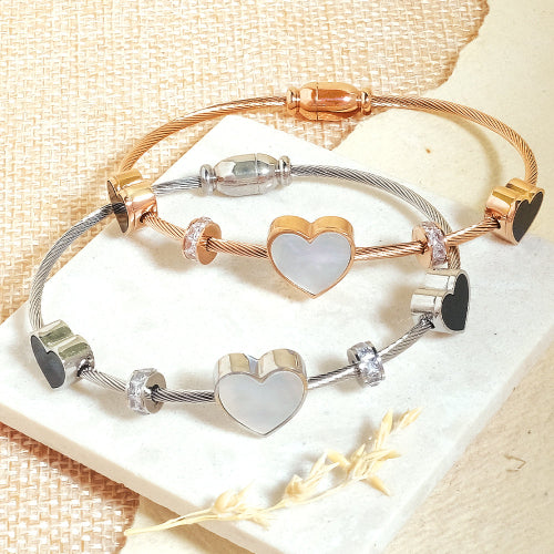Elegant heart bangle with delicate heart detailing and an anti-tarnish finish, available in golden, silver, and rosegold, perfect for everyday elegance, parties, and thoughtful gifting.

