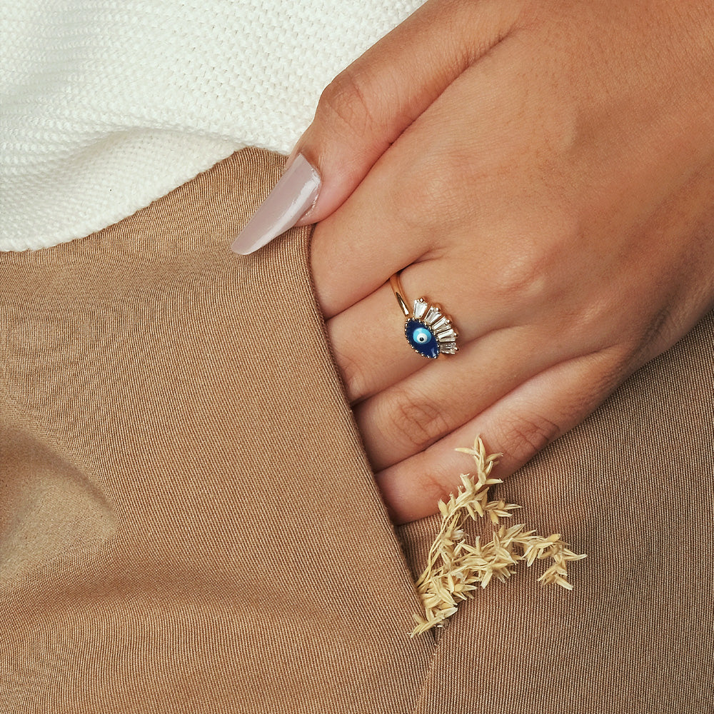 Evil eye ring with eyelash-inspired detailing and an anti-tarnish gold finish, perfect for everyday wear, meaningful styling, and modern statement looks.
