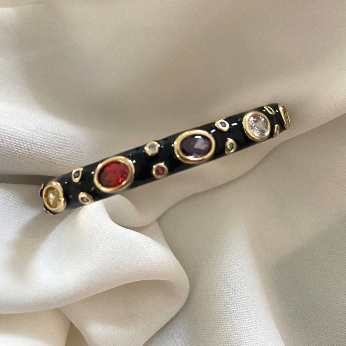Elegant rainbow cuff bangles in soft pastel shades with an adjustable anti-tarnish finish, perfect for everyday wear, playful styling, and adding a colorful touch to any look.