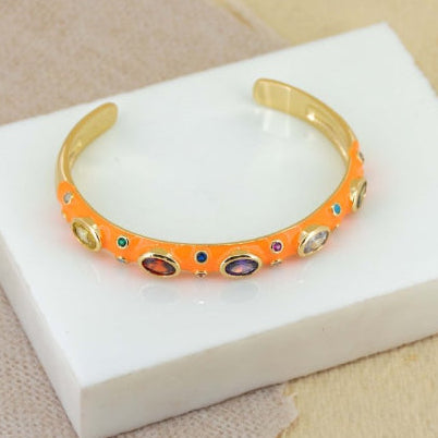 Elegant rainbow cuff bangles in soft pastel shades with an adjustable anti-tarnish finish, perfect for everyday wear, playful styling, and adding a colorful touch to any look.