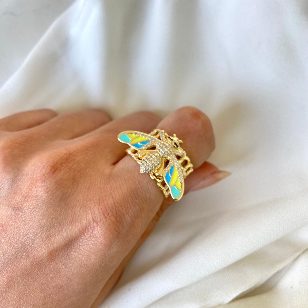 Bee band ring with vibrant enamel detailing and an anti-tarnish finish, available in multicolored shades, perfect for everyday wear, playful styling, and statement looks.
